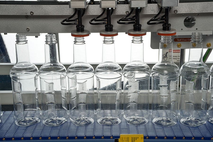 leak testing PET bottles straight on 